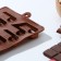 The form for decorations of the share "Notes", silicone, 19.5 × 12 × 1 cm, 15 cells (4.2 × 2.2 cm), brown color