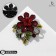 Brooch "Flower" with curls, red color in ferrous metal