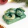 New Year. Symbol 2025. Figure soap "Snake Tourist" Green with gilding