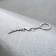 Metal keychain "character and will", 11.5 x 3 cm