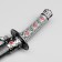 Souvenir weapon "Katana on the stand", black scabbard with red rhombuses, 20cm