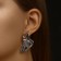 Earrings Metal "Modern" leaf, distortion, color silver