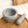 A mortar with a pestle made of stone is large, 450 ml, gray, in a box