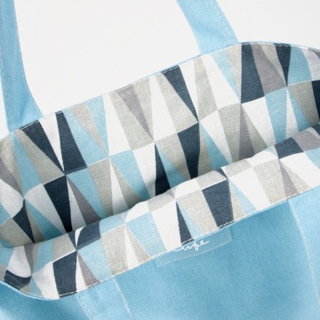 The shoper bag is bilateral, without fastening, outer pocket, blue color-3
