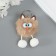Fluffy on the ring "oblique eyes" brown 9.5x6x6 cm