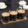 A set of ceramic cans for bulk products with spoons on a wooden stand “Sweet Time”, 3 objects: 300 ml, black color