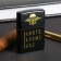 The gasoline lighter “Nobody except us”, 5.5 x 3.5 cm.