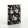 Women's wallet on the button, black color
