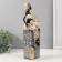 Polystone souvenir "African with a tambourine on a column with patterns" white-black, gold 10.5x9x32 cm 10325