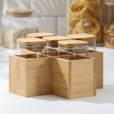 A set of glass cans for bulk products with bamboo covers 