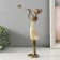 Polystone souvenir "Girl plays on the pipe, with a bird" Sand with bronze 19x6.5x27.5 cm
