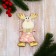Soft suspension "Deer in a suit with a geometric pattern" 6x12 cm, pink