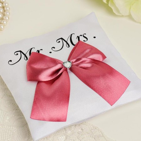 Smith's pillow for the rings, white with a pink bow