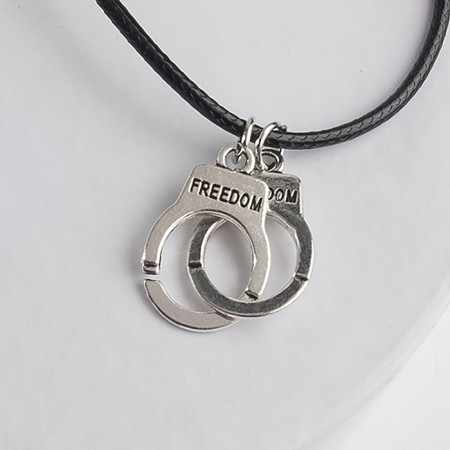 Piece on the cord "handcuffs", color black silver on a black lace, 42 cm