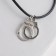 Piece on the cord "handcuffs", color black silver on a black lace, 42 cm
