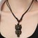 A pendant on the lace "Filin", the color is brown-black on a black lace, 80 cm