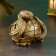 The piggy bank "Snake on the barrel" gold, 15x11x12cm