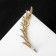 Earring "Kaff" feather rhinestones, white color in gold