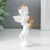 Polystone souvenir "Snowthrough angel with a wreath of gold roses" 5x4.5x12 cm