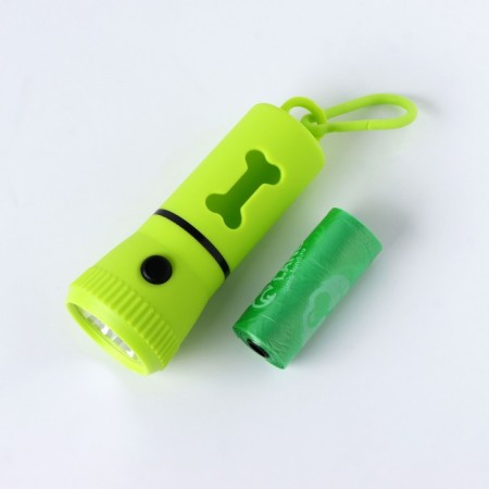 A container with a flashlight, cleaning packages for dogs (roll 15 pcs), green-1