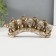 Polystone souvenir "Five elephants on a stone in blankets with fringe" 11x24.5x4.5 cm