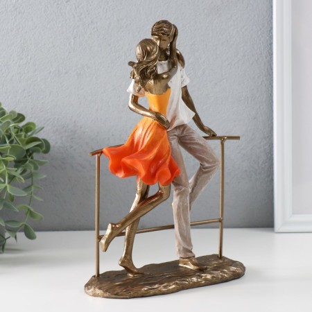 Polystone souvenir "Kiss on the bridge" of bronze, orange-white 17x8x25 cm-1