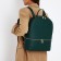 Women's backpack made of artificial leather with lightning, 2 pockets, green color