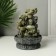 The desktop fountain from the Buddha with Flower Waterfall network is gray 20.5x20.5x27 cm