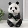Figure "Panda Burning" height 23 cm, width16 cm, length 14.5 cm.