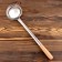 A cook for cauldron Uzbek 46cm, light wooden handle