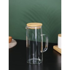 Glass jug with a bamboo cover 