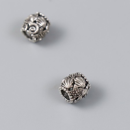 Bead for creativity Metal "Sea bottom with shells" silver 0.9x1.1 cm