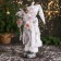 Santa Claus "in a high cap, in a strap and with a bag" 44 cm, silver-white