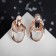 Earrings Metal "Geometry" ovals on the ring, color pink gold