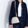 Cross-Bodi Bag on a zipper, beige color