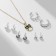 Set of 6 items: 3 pairs fluffs, pendant 2 rings "owl", colored in gold, 45 cm