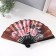 Fan plastic, textile h = 26.5 cm "Large roses on a coffee background"