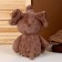 Soft toy "Bear" in an elephant suit, 40 cm, brown color