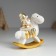 Suvenir Polystone "Santa Claus in a gold caftan on a cap-cap" 10.5x6x11.5 cm