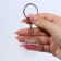Acrylic keychain with a joke "is difficult to be modest", diam. 4.5 cm