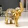 Souvenir Polystone "Golden Elephant in the Mirror Popone" 13.5x14x6 cm mix