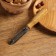 Vegetable cleaner with a wooden handle, stainless steel