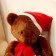 Soft toy "Bear", in the New Year's cap, 20 cm, brown color