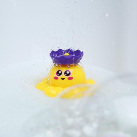 The octopus bath toy, a fountain, a button on, the color of a mix, crumb I-1