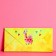 An envelope for money with a wooden element "Congratulations" yellow background