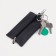Key of zipper, length 13 cm, metal ring, black color