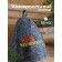 A cap for a bath with embroidery from gray felt "100% man"