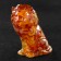 Souvenir "Leo", sits, amber