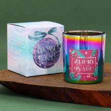 New Year's candle in a glass 