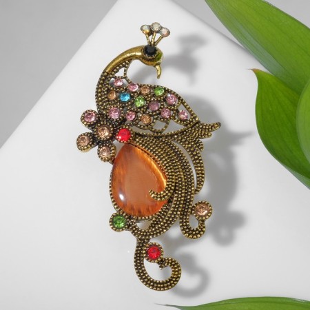 Brooch "Peacock" elegant, colored in black gold